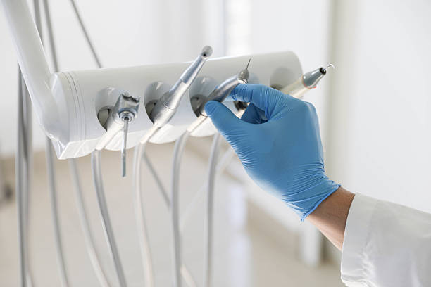 Professional Emergency Dentist technician working in Elm Springs, AR